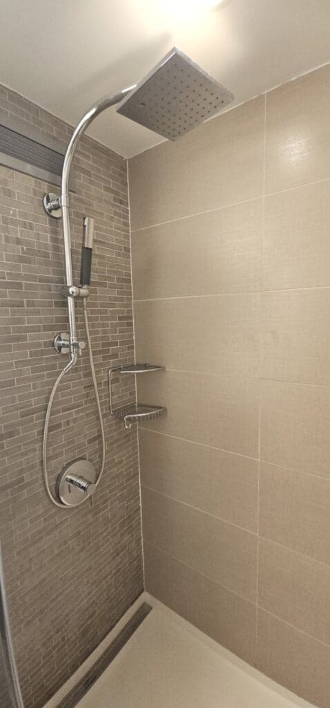 a shower with a shower head