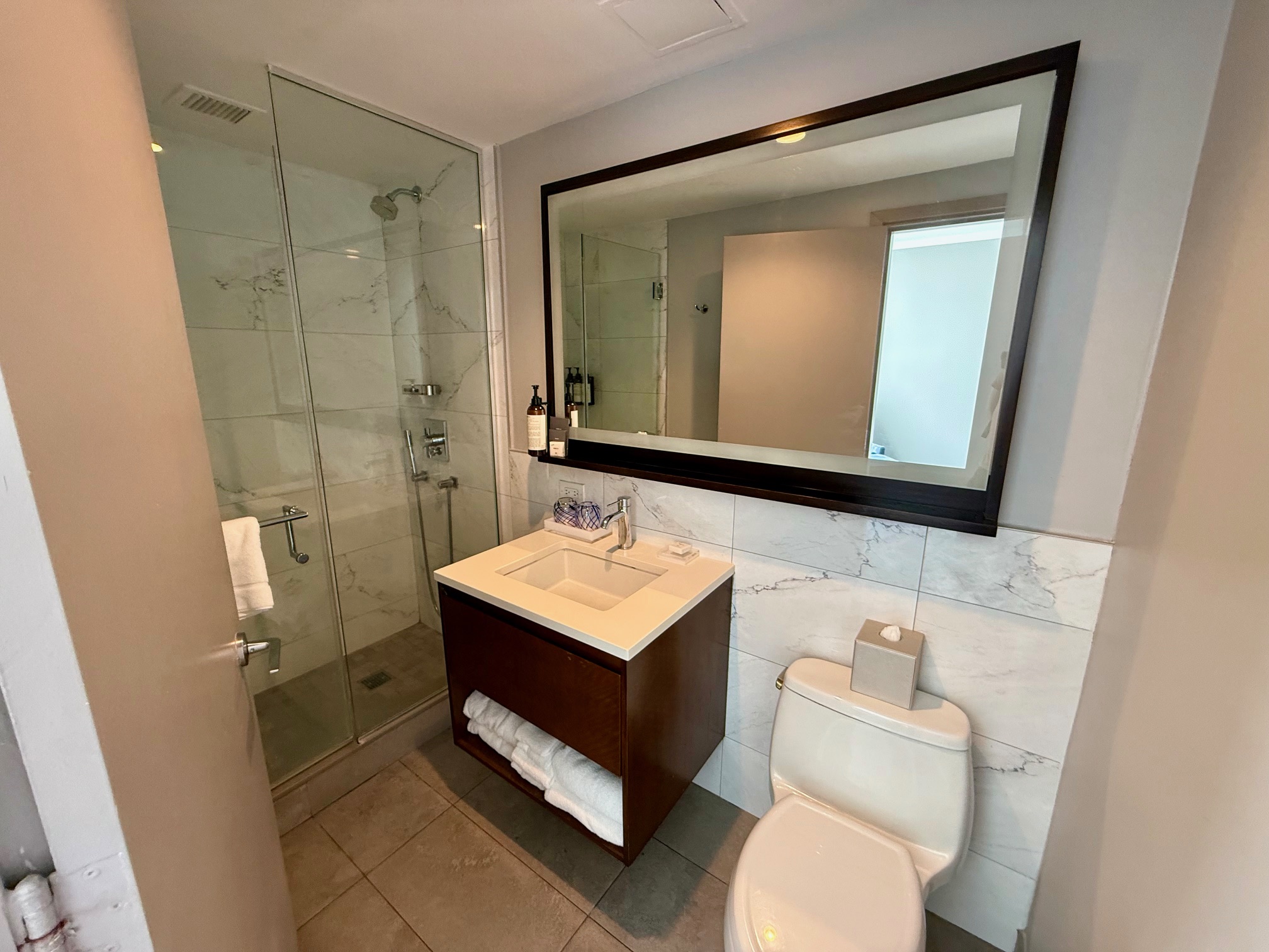 a bathroom with a mirror and sink at the Fairmont El San Juan