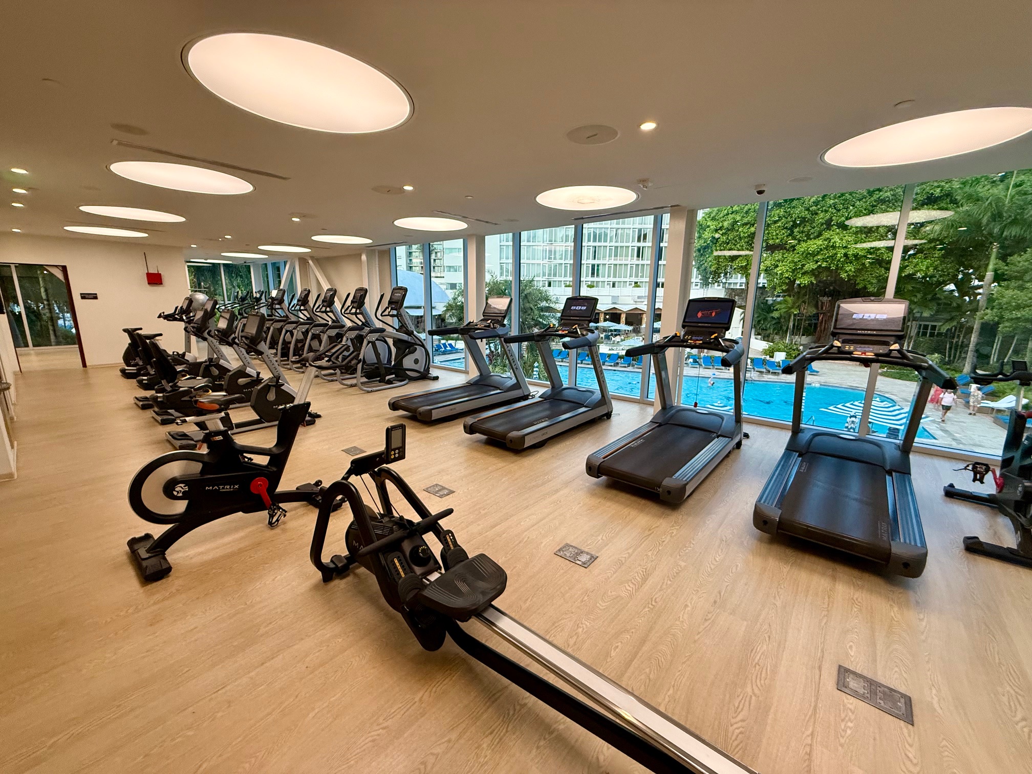 a large room with exercise machines