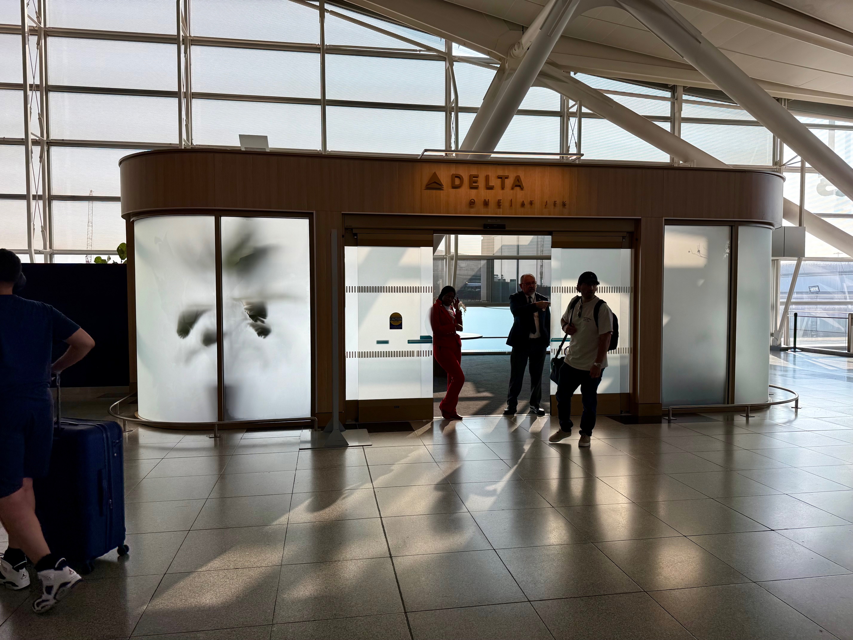 a group of people standing in a building