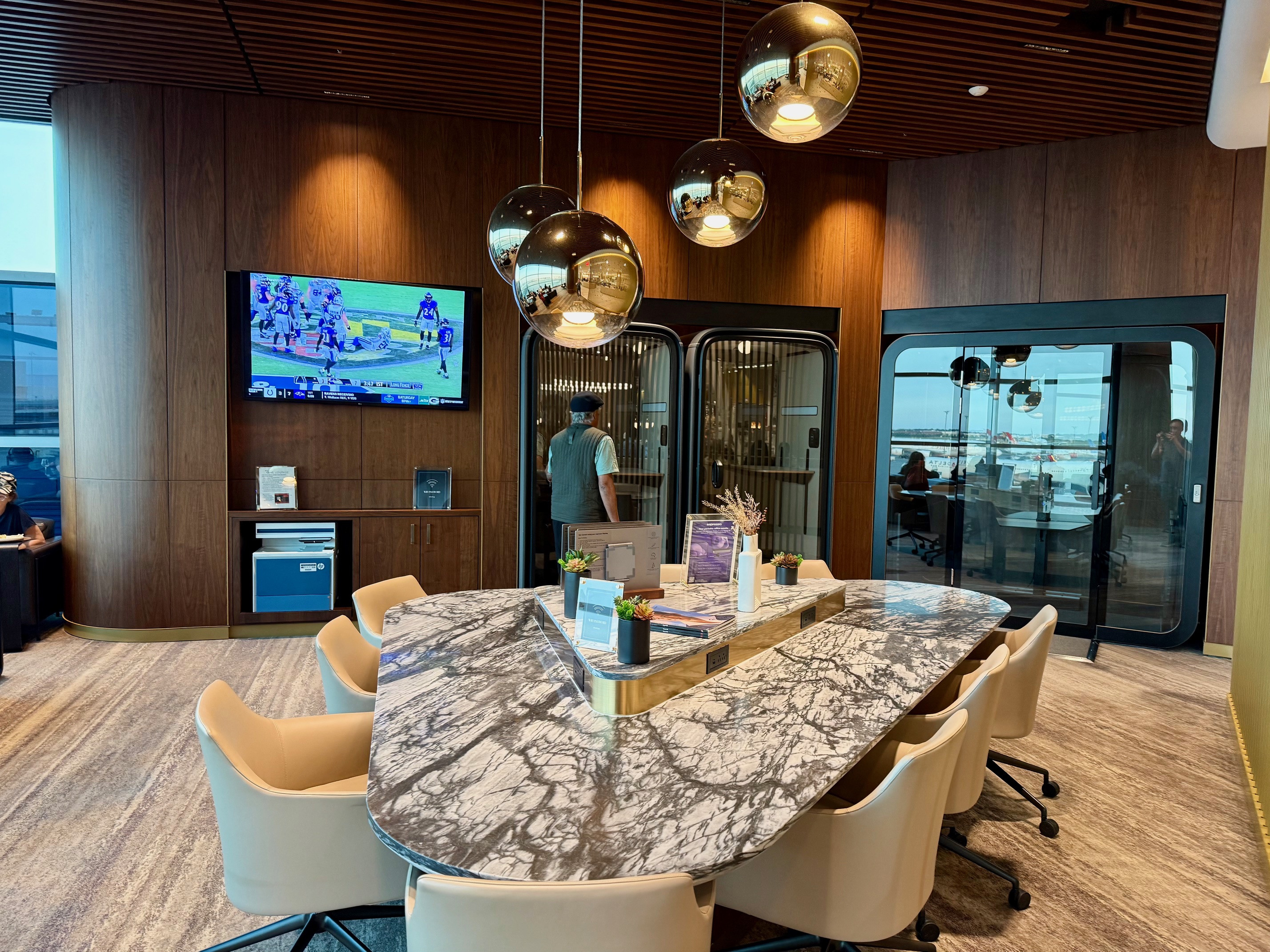 a conference room with a large table and chairs