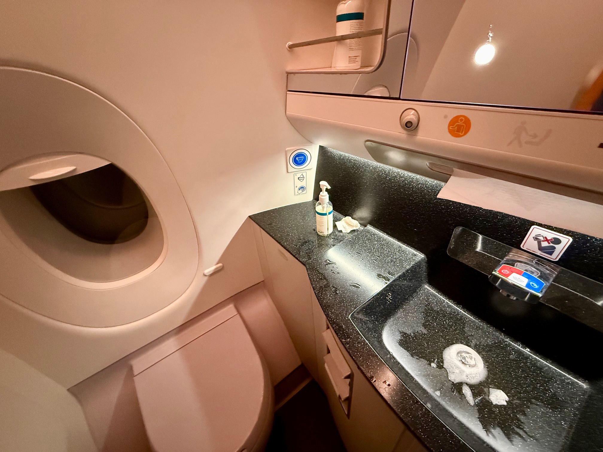 a sink and toilet in a bathroom