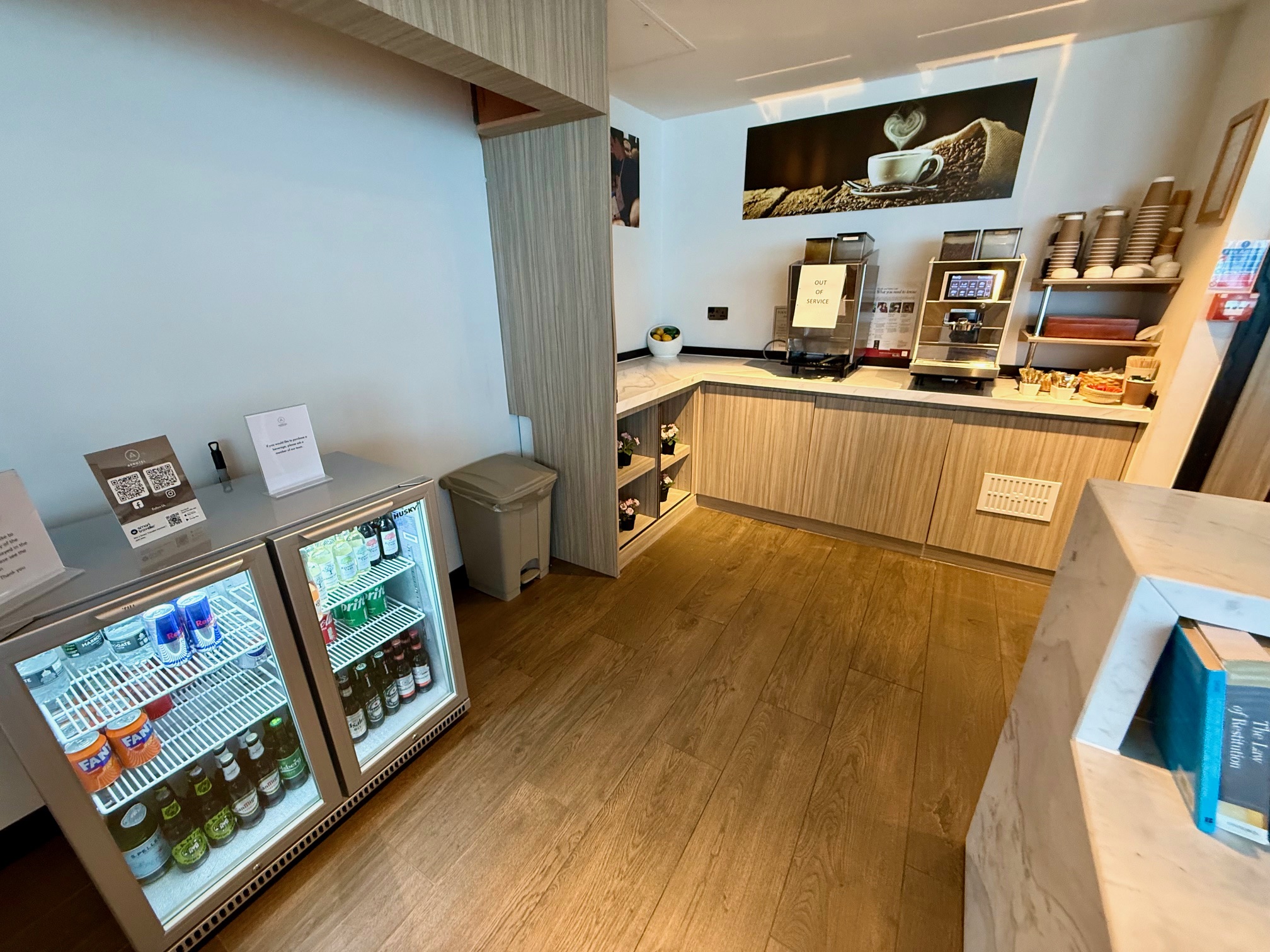 a room with a refrigerated fridge and drinks