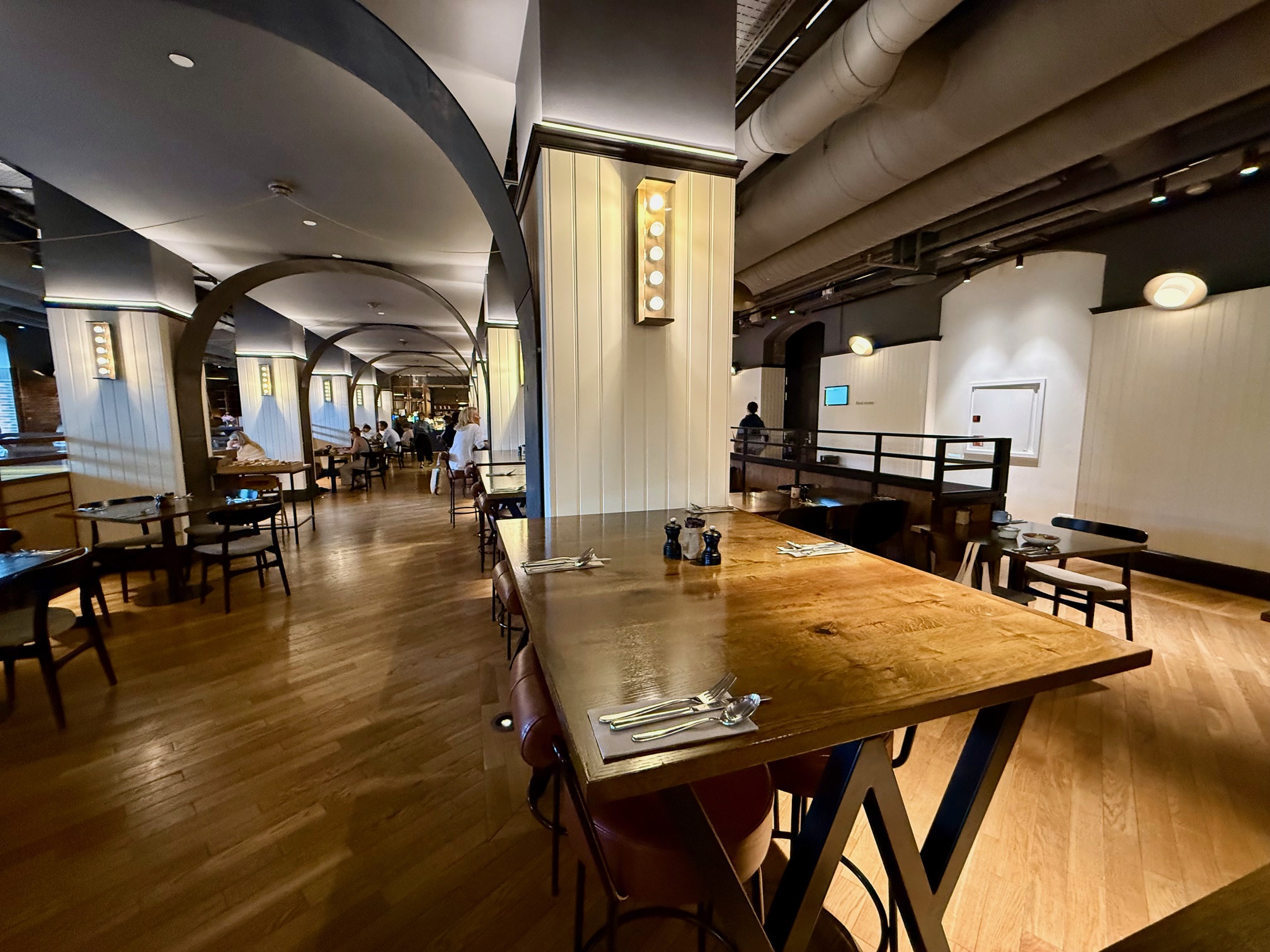 a restaurant with tables and chairs at Villa Copenhagen