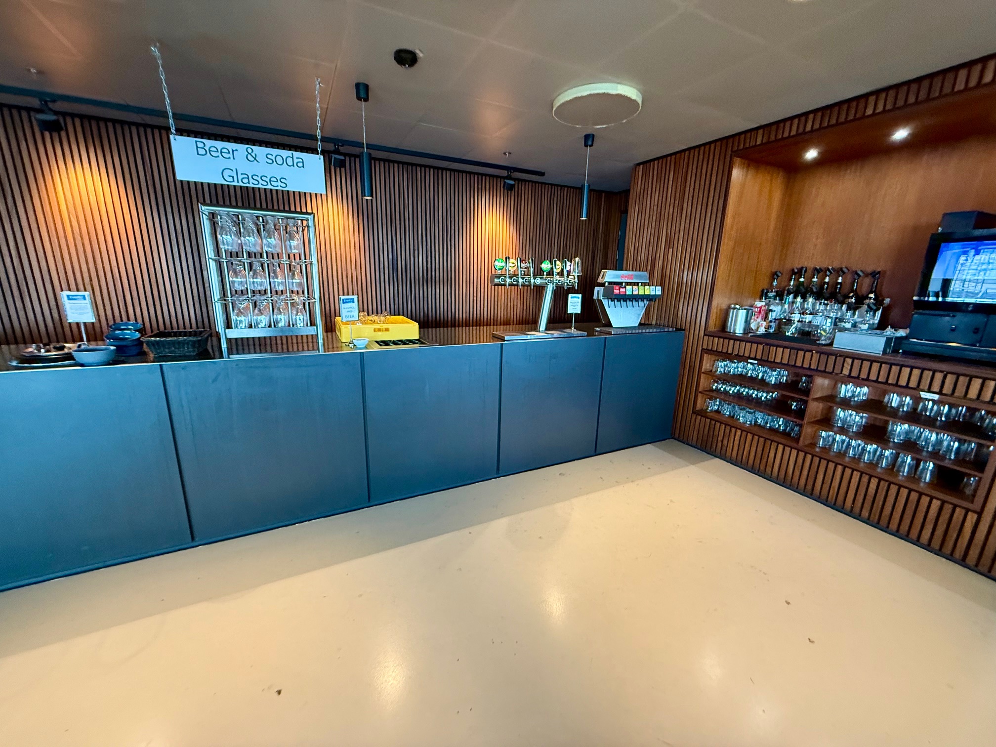 a bar with bottles and glasses at the Eventyr Lounge Copenhagen