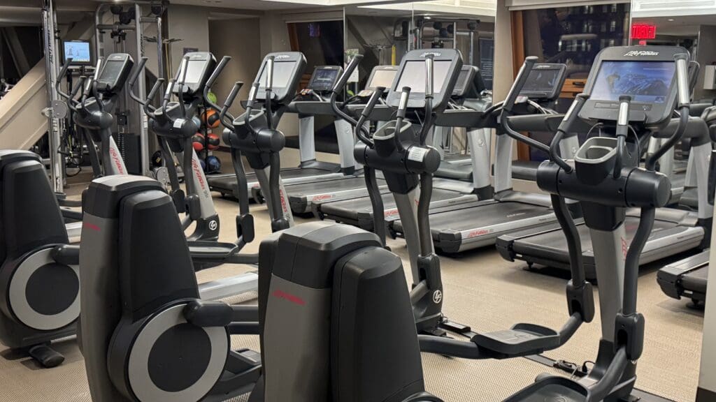 a group of treadmills in a gym