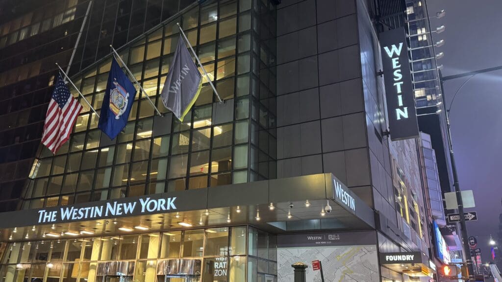 a building with flags on the front