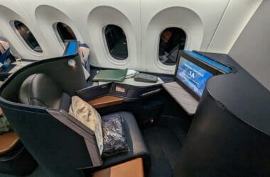 a computer on a chair in a plane