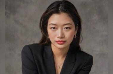 a woman in a black suit