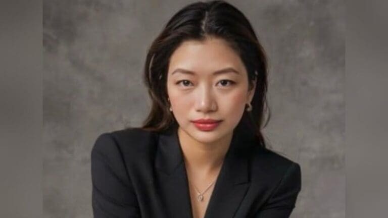 a woman in a black suit