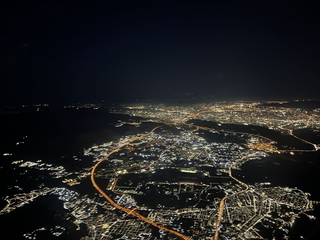 an aerial view of a city at night