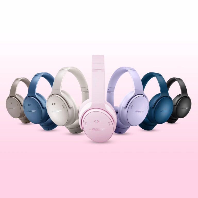 7 sets of Bose QuietComfort headphones in various colors on a pink and white background