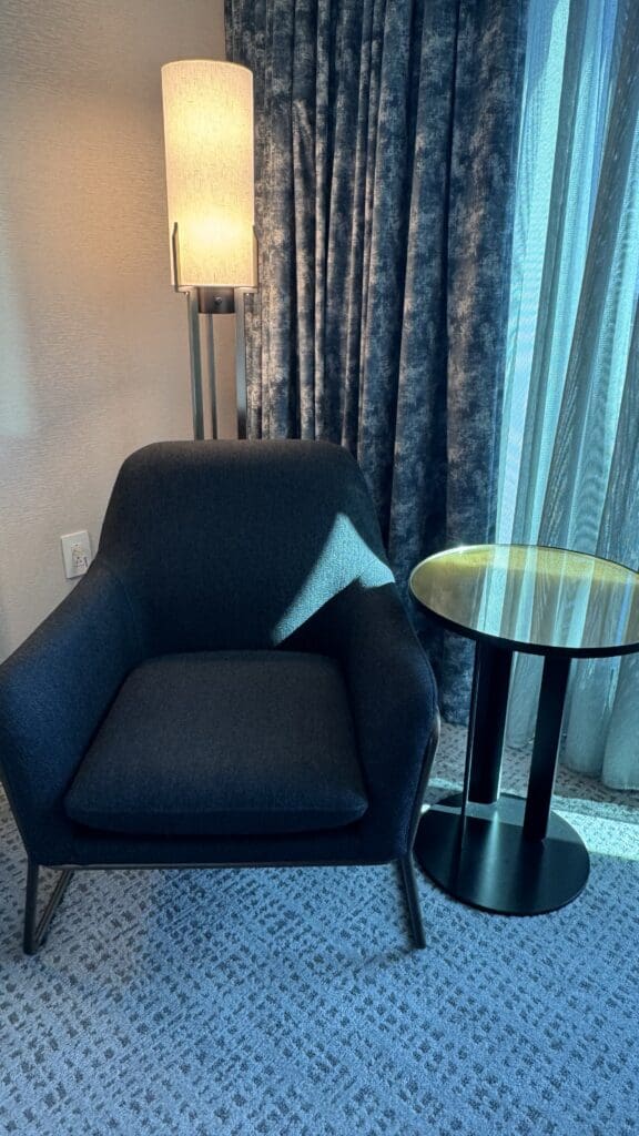 a chair next to a table