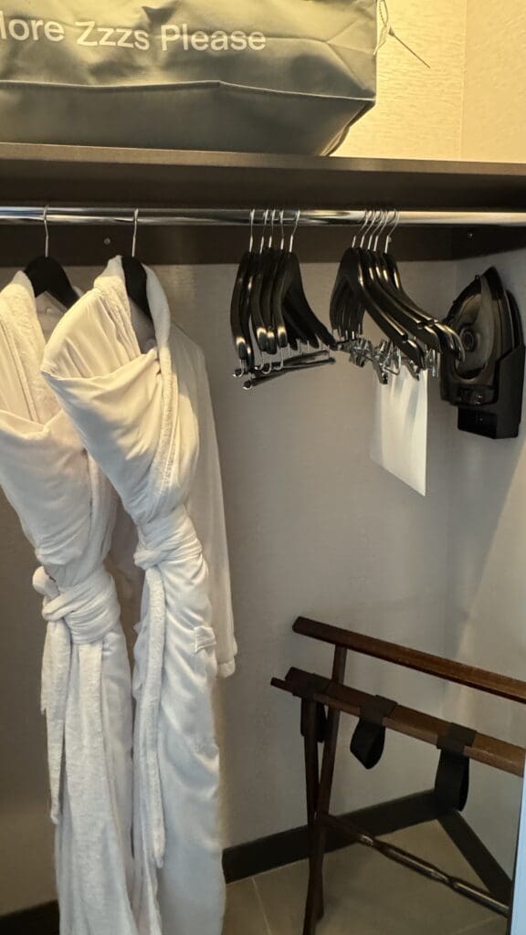 a white robe on a rack