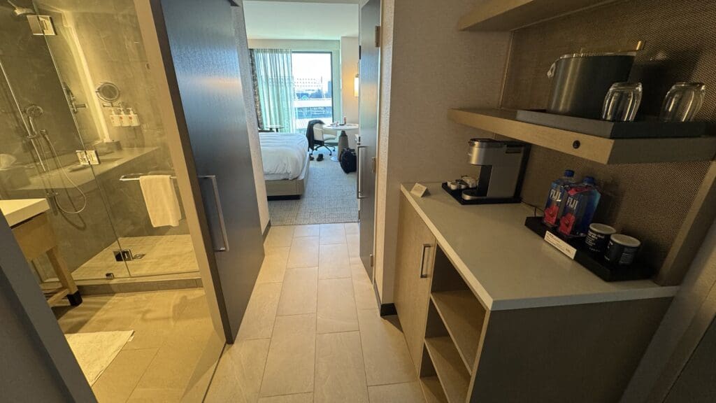 a room with a bed and a desk