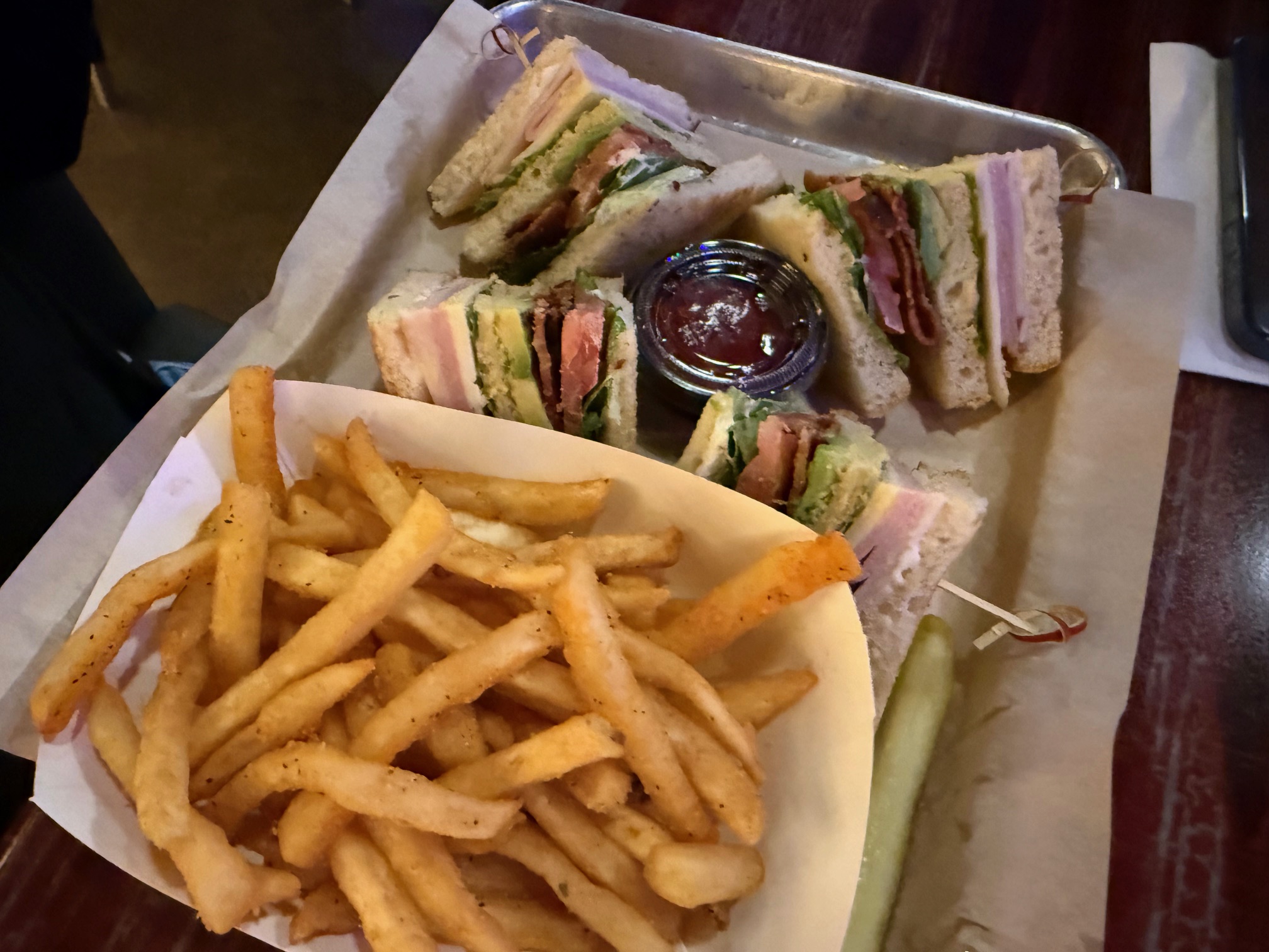 a tray of sandwiches and fries
