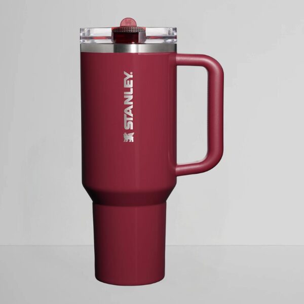 A red Stanley Quencher ProTour Flip Straw Tumbler on a neutral background