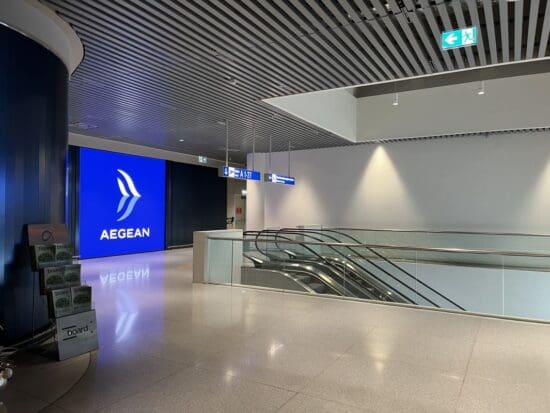 an empty airport with escalators