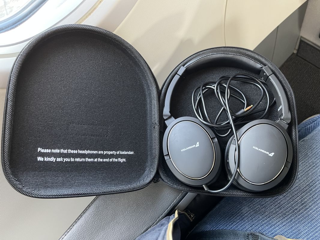 a black case with headphones in it