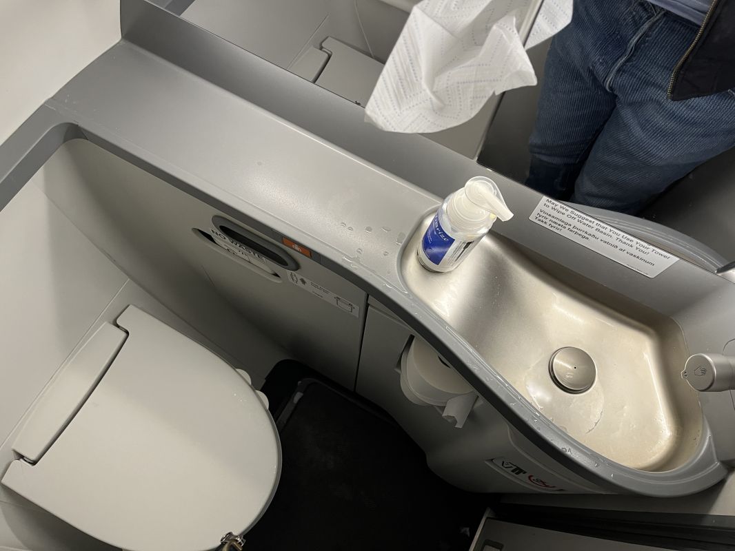 a sink and toilet in a plane