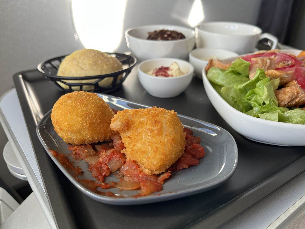 a plate of food on a tray