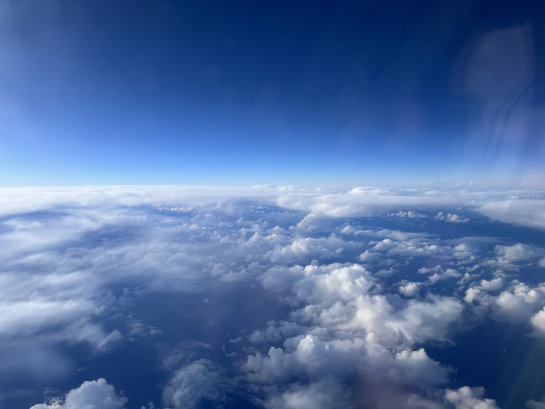 clouds and blue sky above clouds