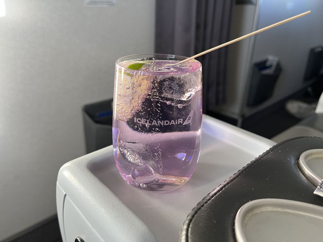 a glass with a drink in it