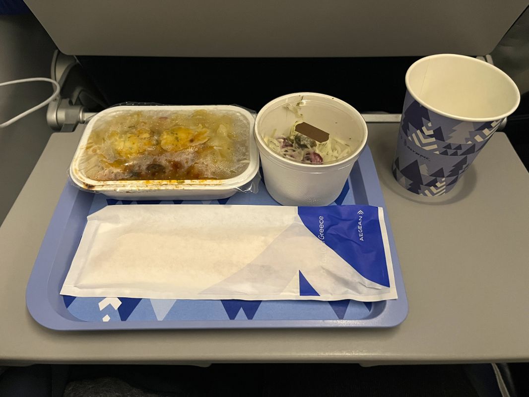 food on a tray on a plane