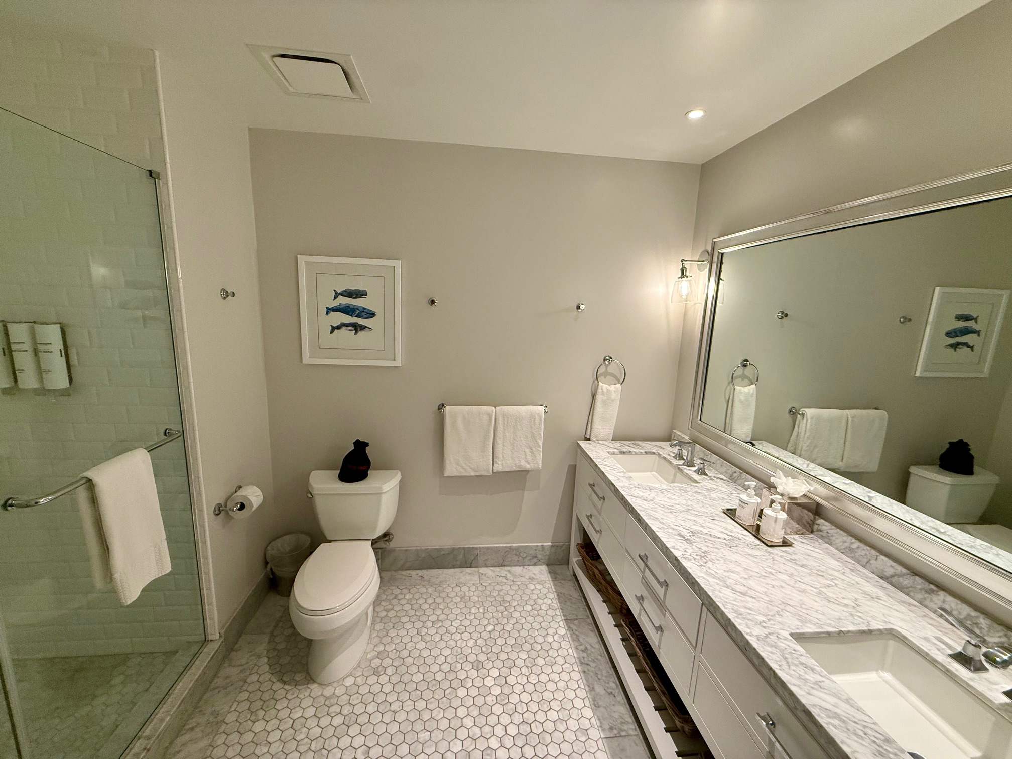 a bathroom with a sink and toilet at the Vespera Resort Pismo Beach