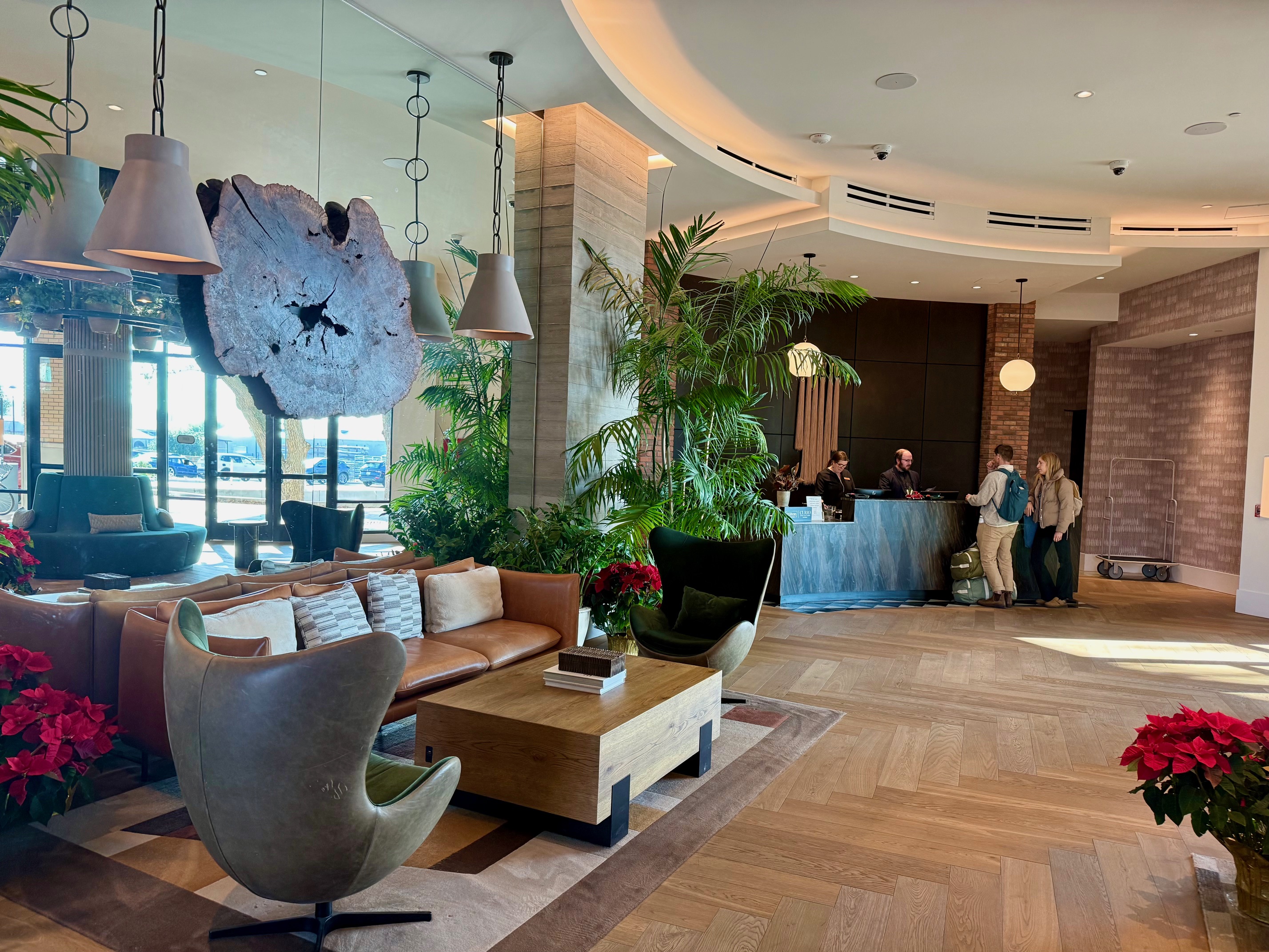a lobby with a large table and chairs at the Ava Paso Robles