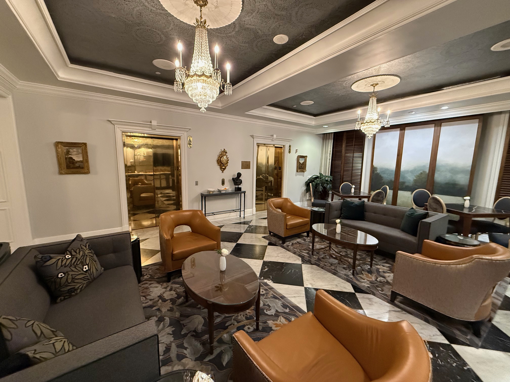 a room with couches and chairs