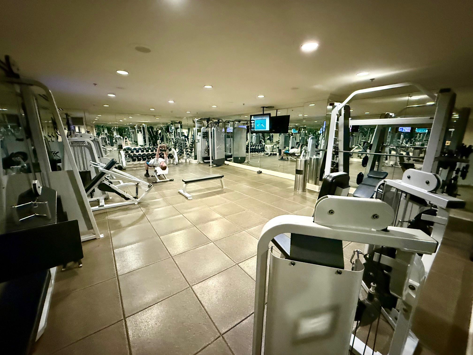 a gym with many equipment