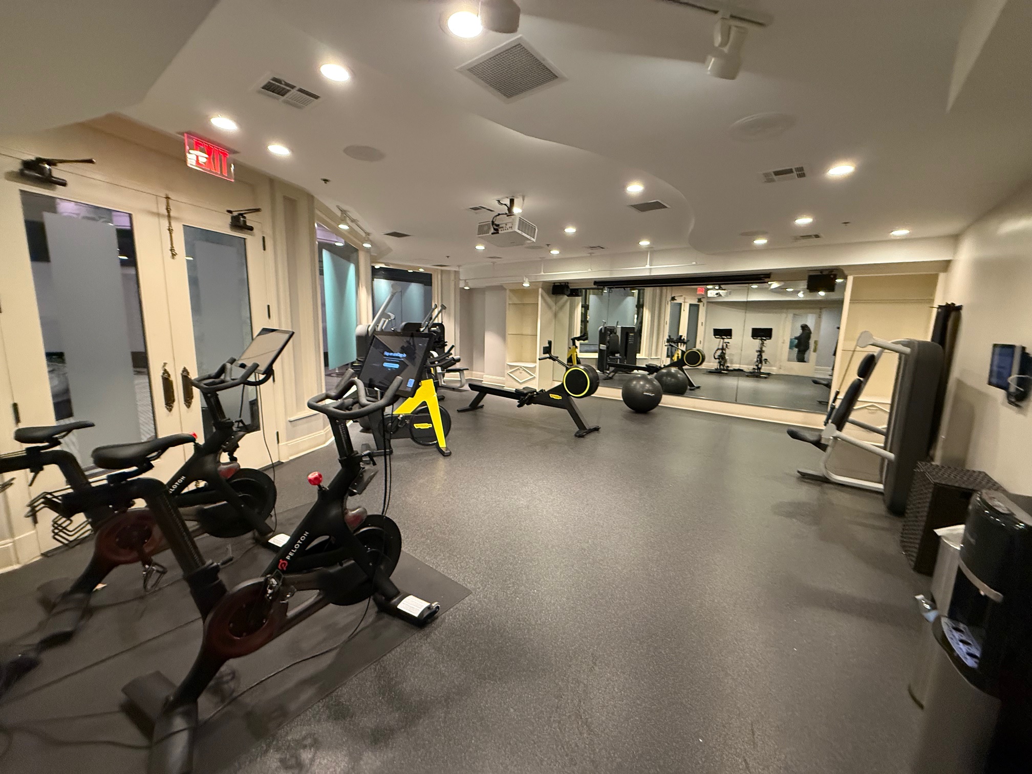 a room with exercise bikes and exercise equipment