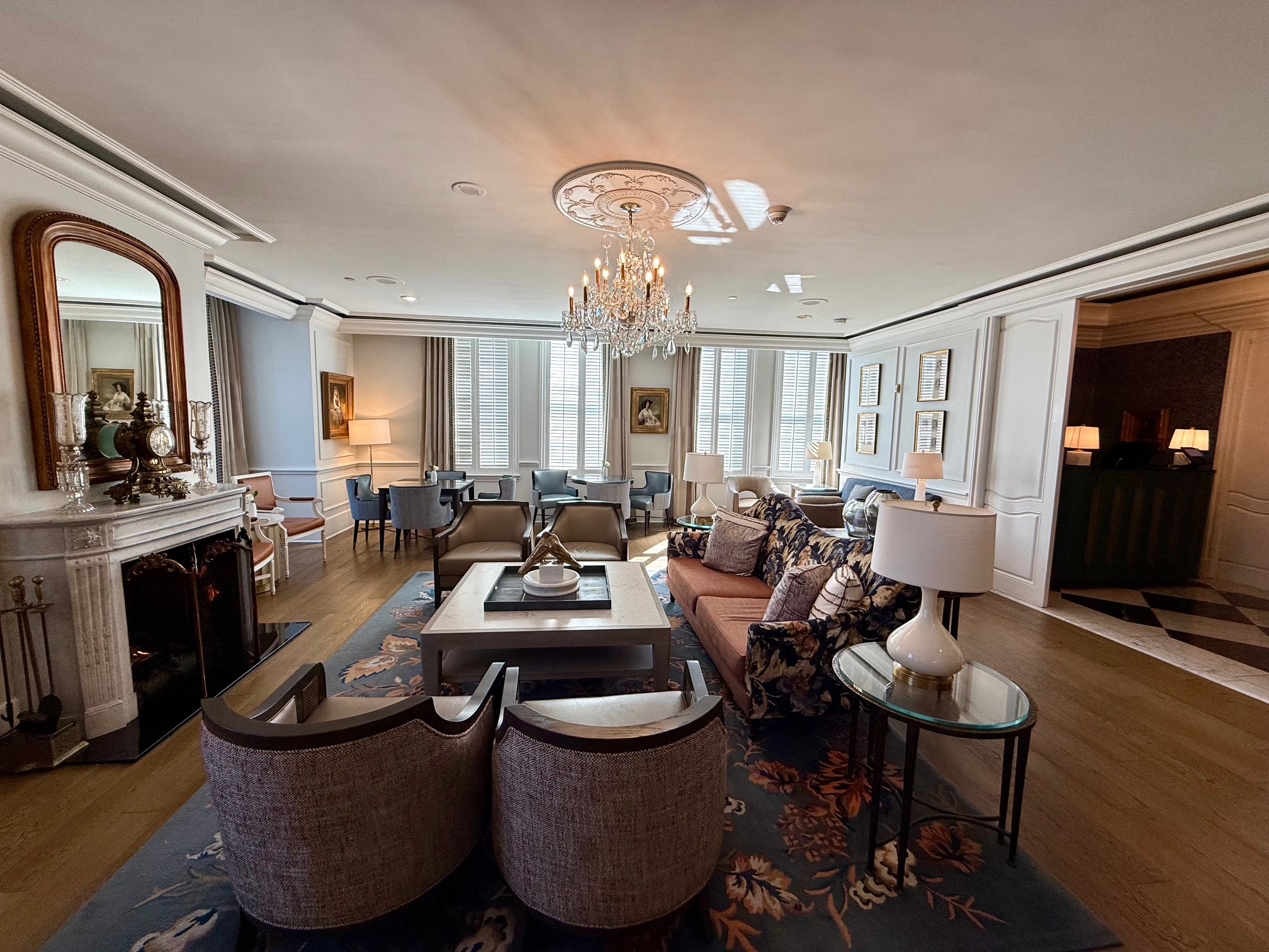 a room with a fireplace and couches