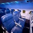 a row of seats in a Delta Air Lines A319