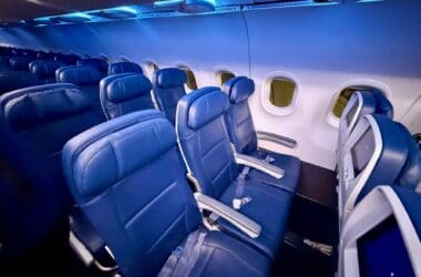 a row of seats in a Delta Air Lines A319