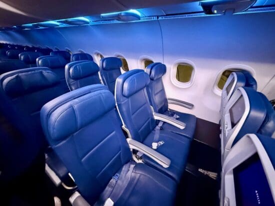 a row of seats in a Delta Air Lines A319