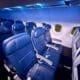 a row of seats in a Delta Air Lines A319