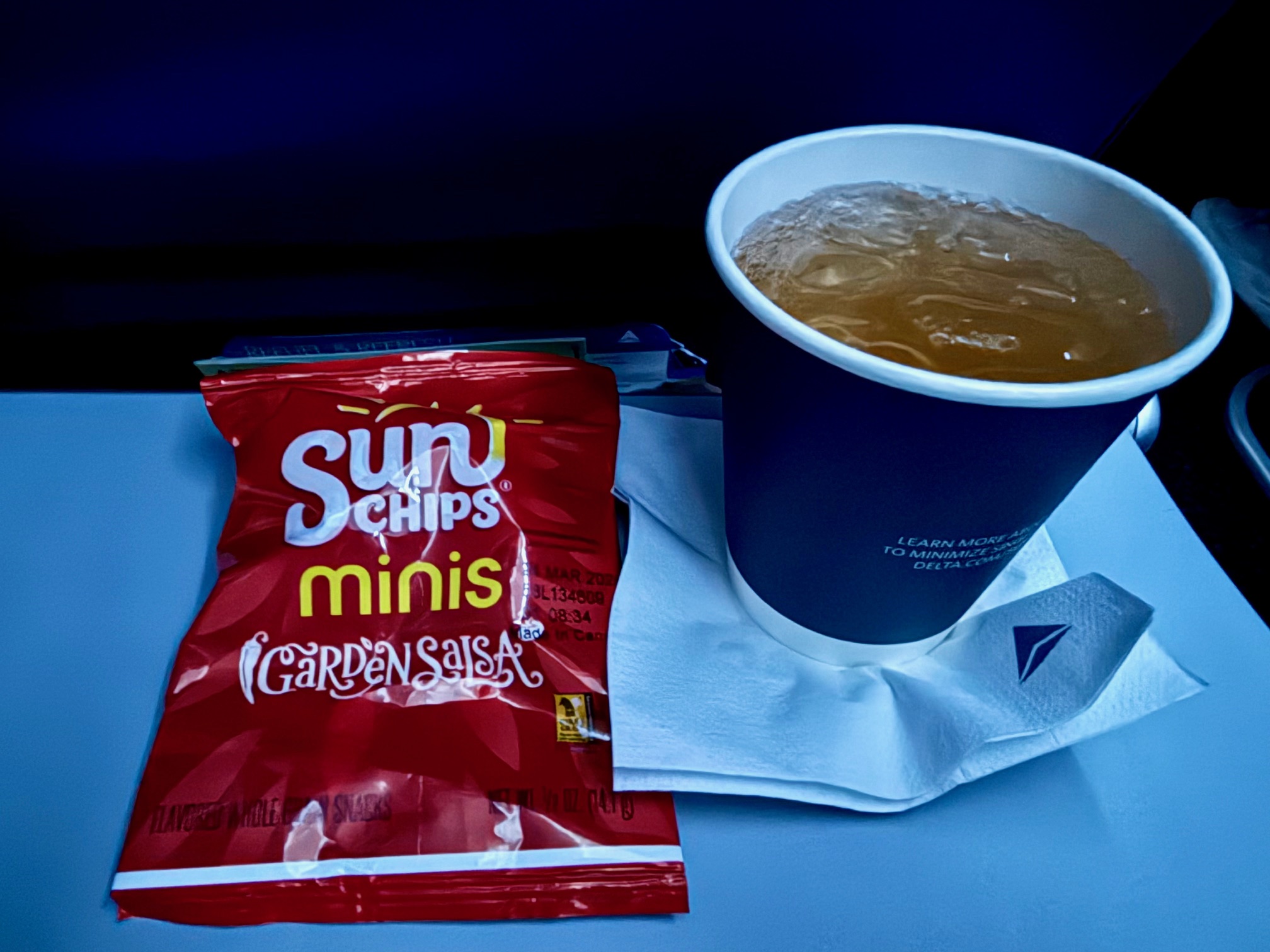 a cup of tea and a packet of chips