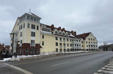 Long Trail House Stratton with a street in the background
