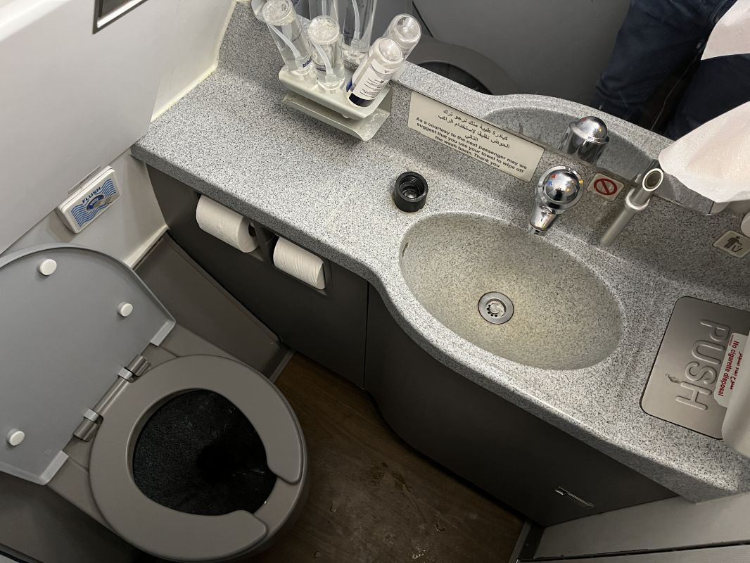 a sink and toilet in a bathroom