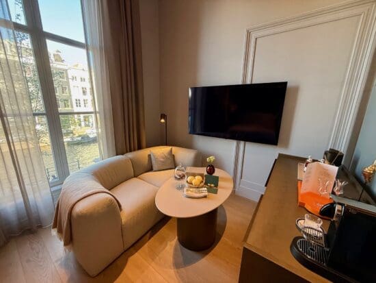 a living room with a couch and a tv