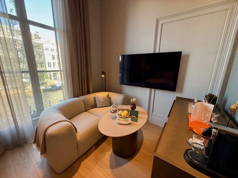 a living room with a couch and a tv