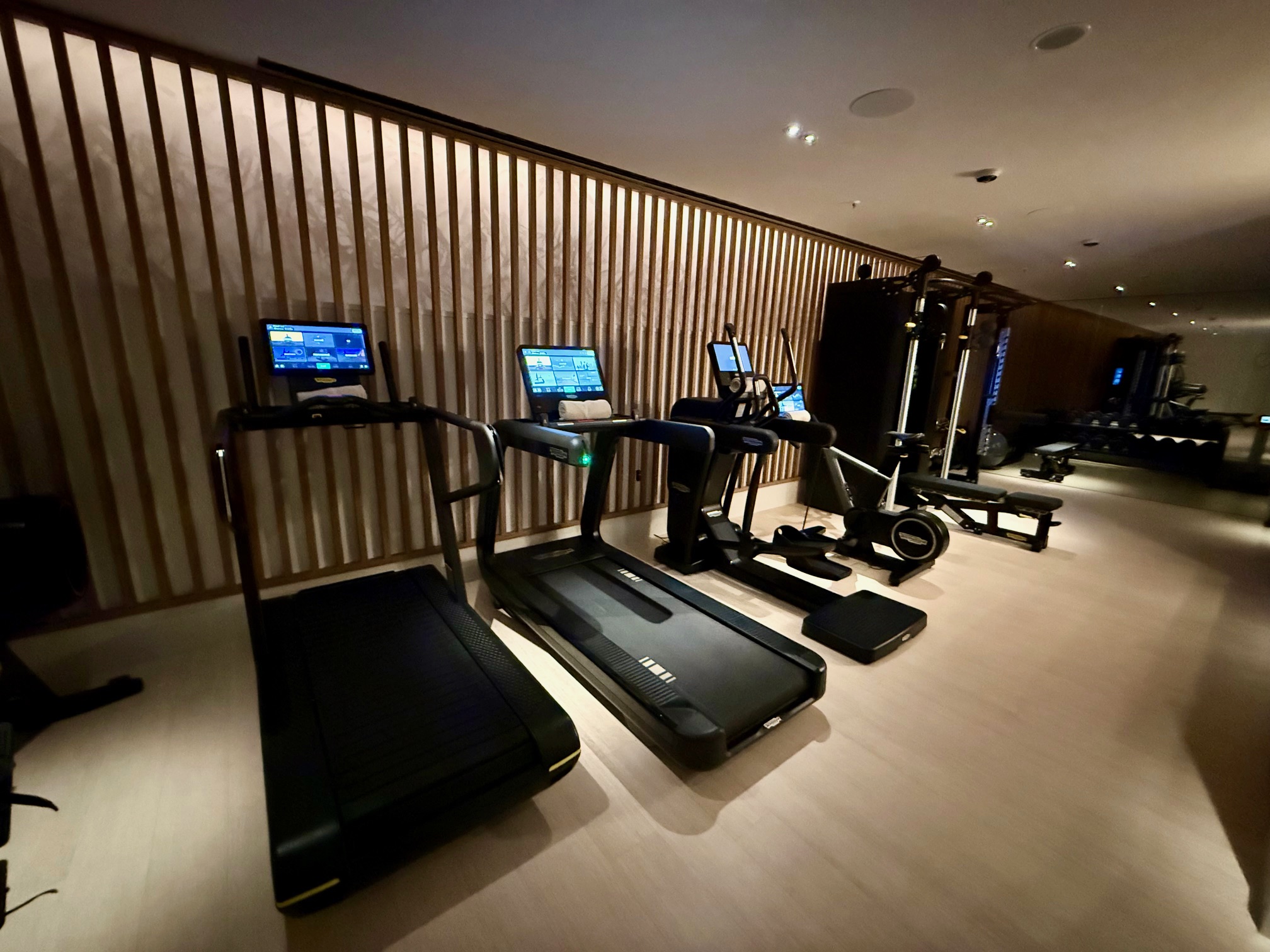 a group of treadmills in a room