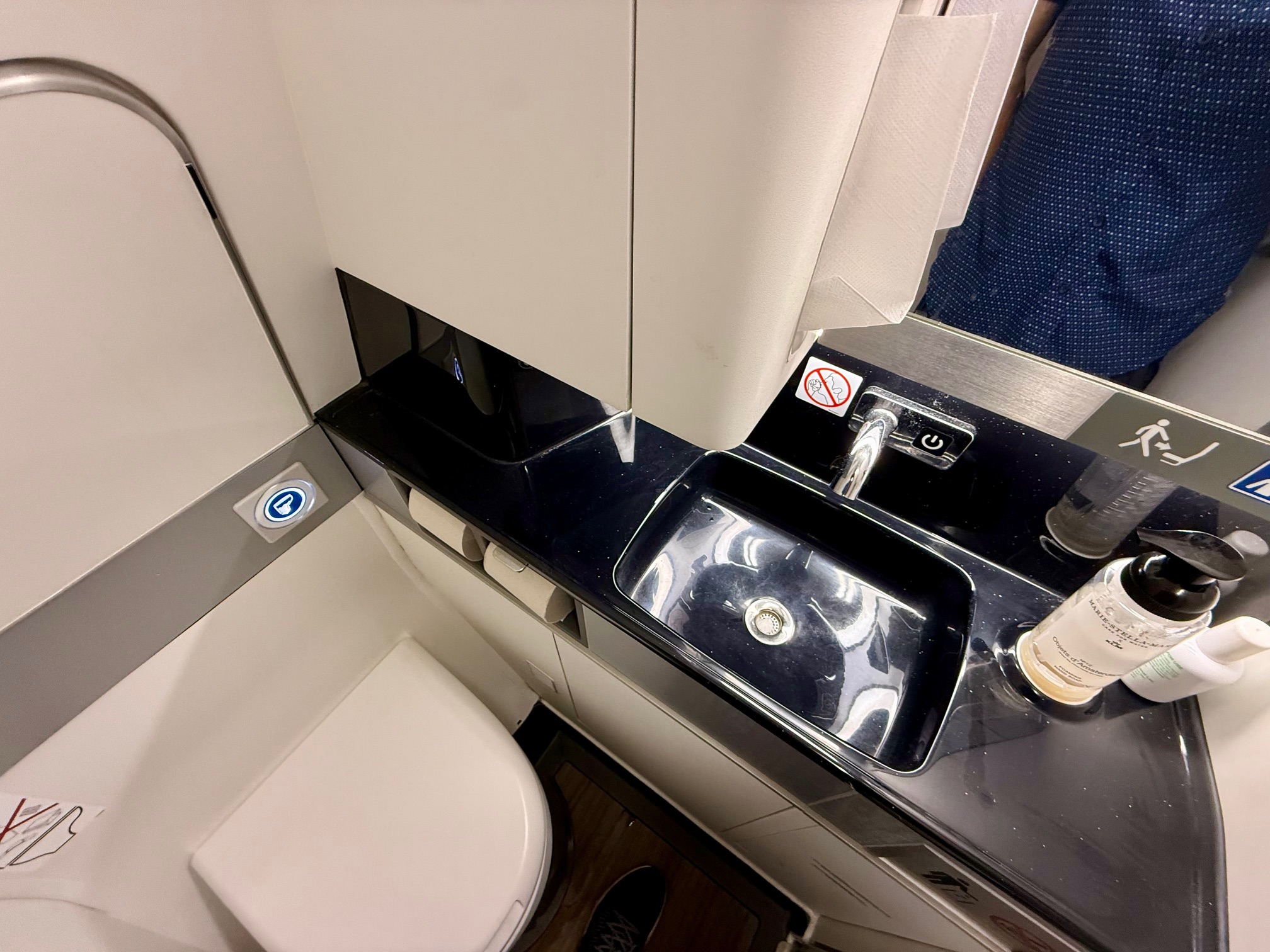 a sink and toilet in a bathroom