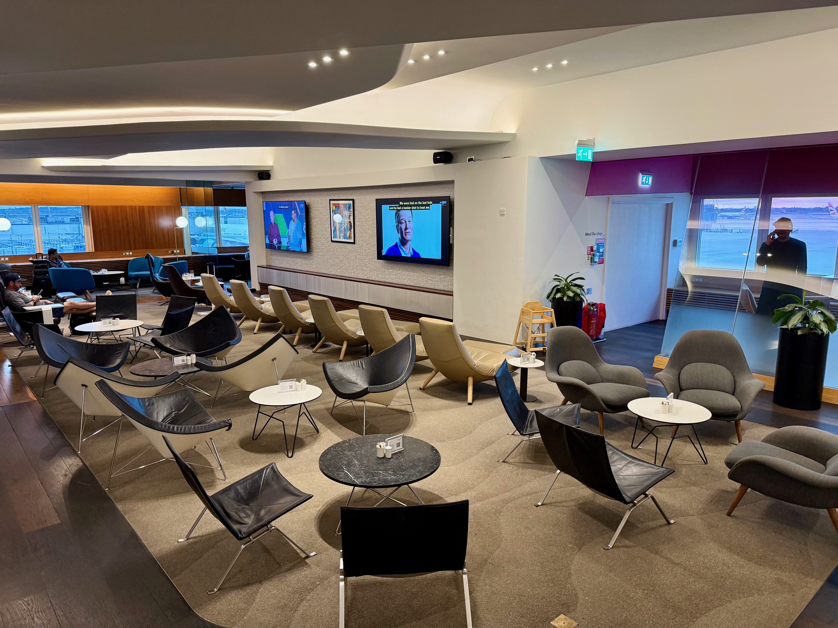 a room with chairs and tables