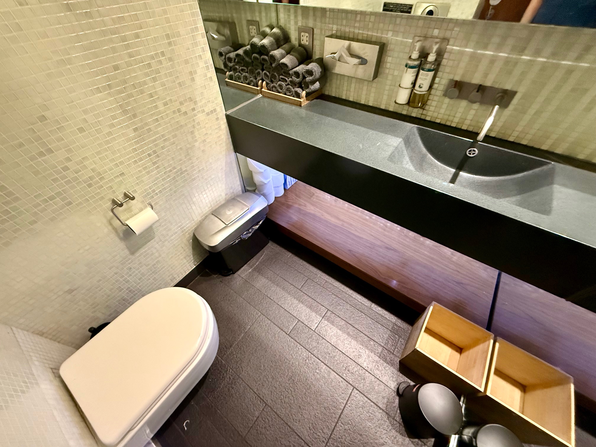 a bathroom with a sink and toilet at the Virgin Atlantic Clubhouse London