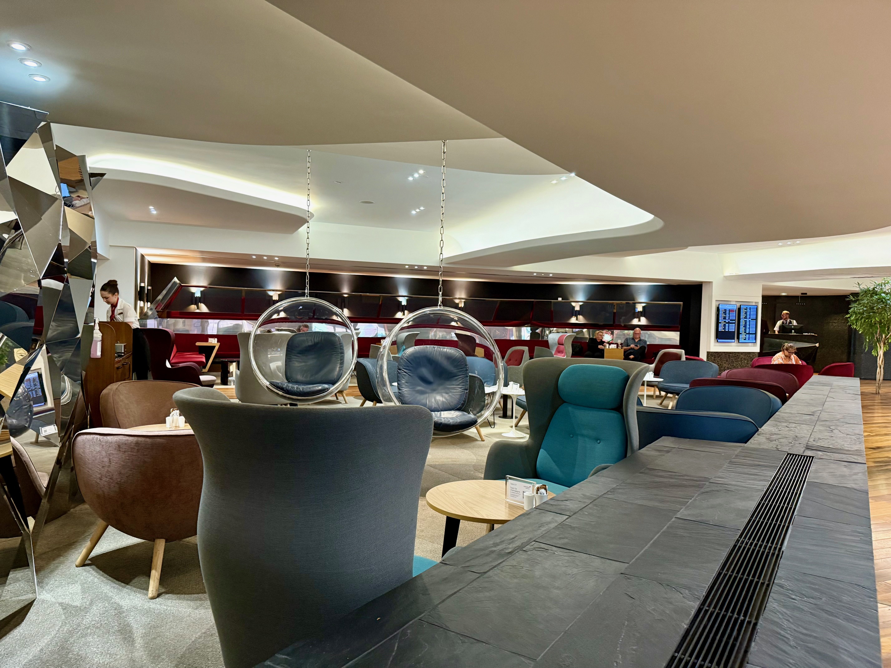 a room with chairs and tables