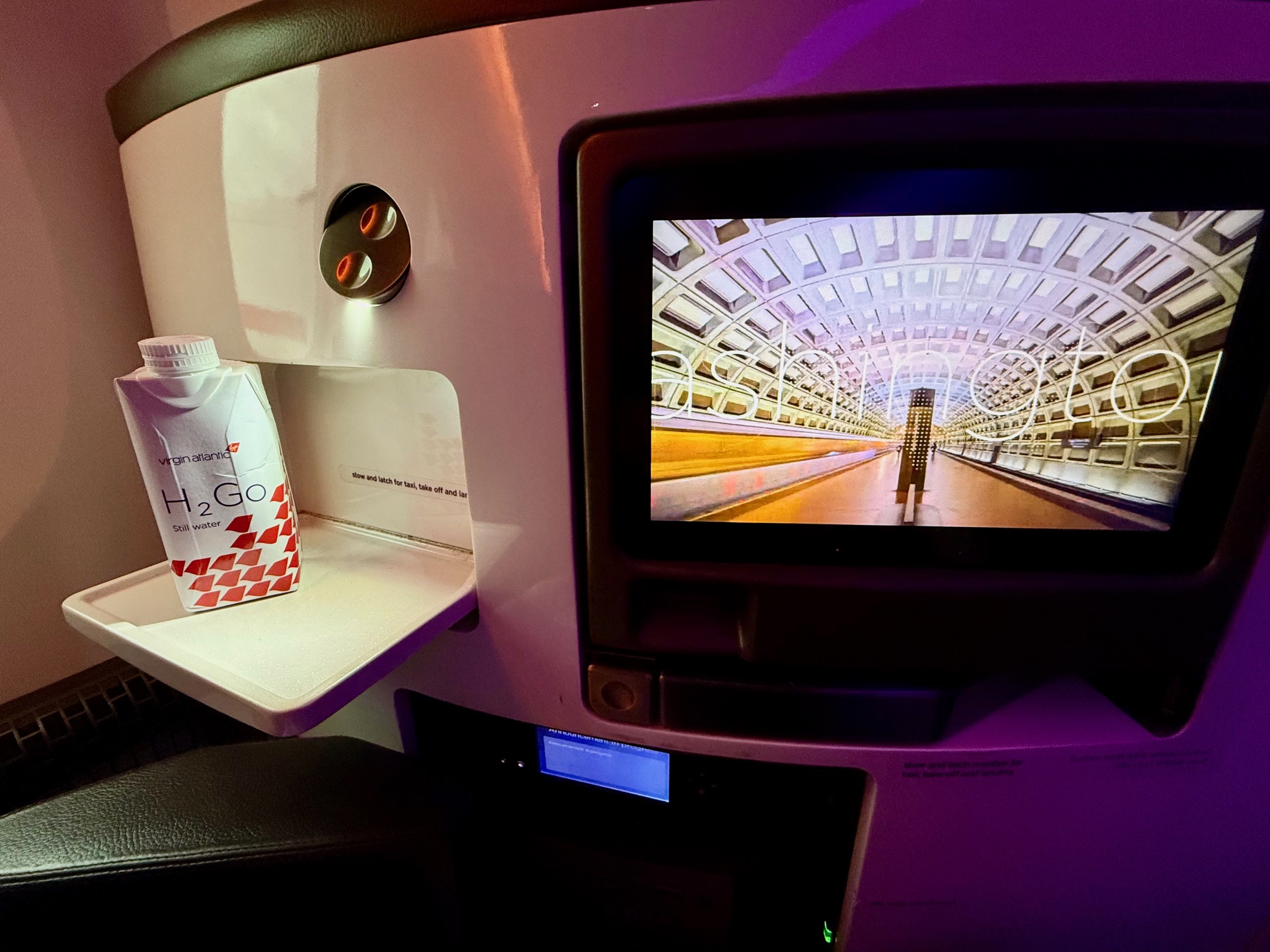 a tv on a shelf on the Virgin Atlantic 787-9 Upper Class product