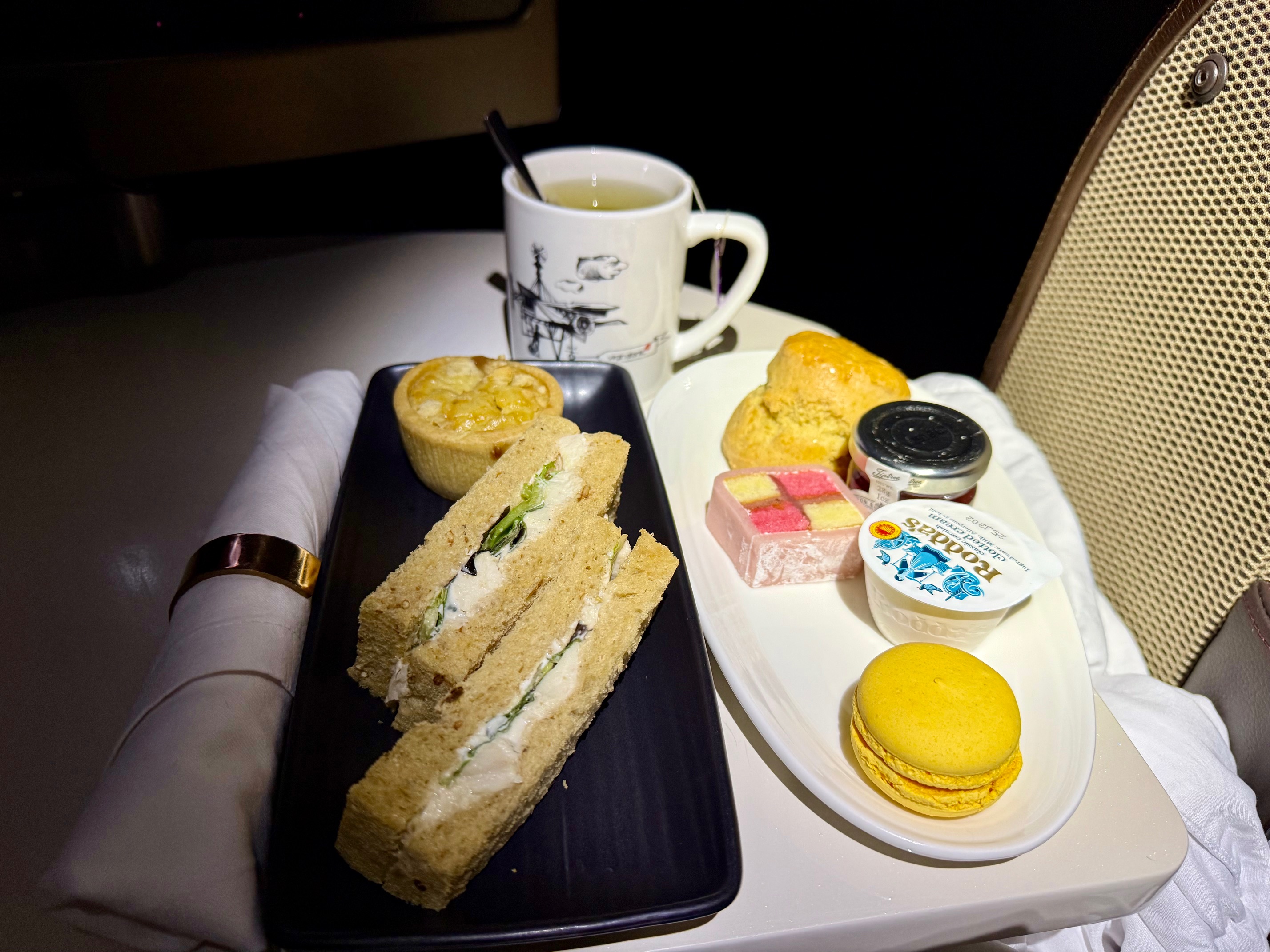 a plate of food and a cup of tea on Virgin Atlantic 787-9 Upper Class